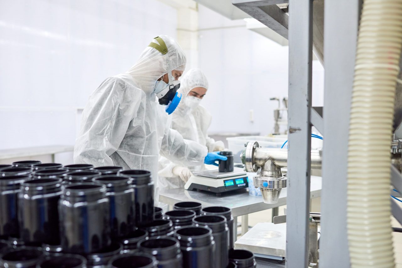 pharmaceutical-plant-workers-using-scale-2021-04-02-23-21-13-utc-scaled-1280x855.jpg