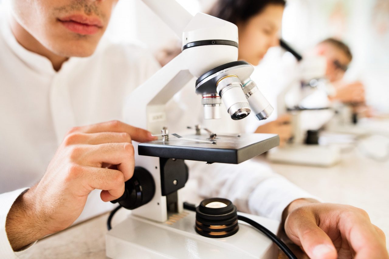 unrecognizable-high-school-students-with-microscop-2021-04-02-15-19-08-utc-scaled-1280x854.jpg