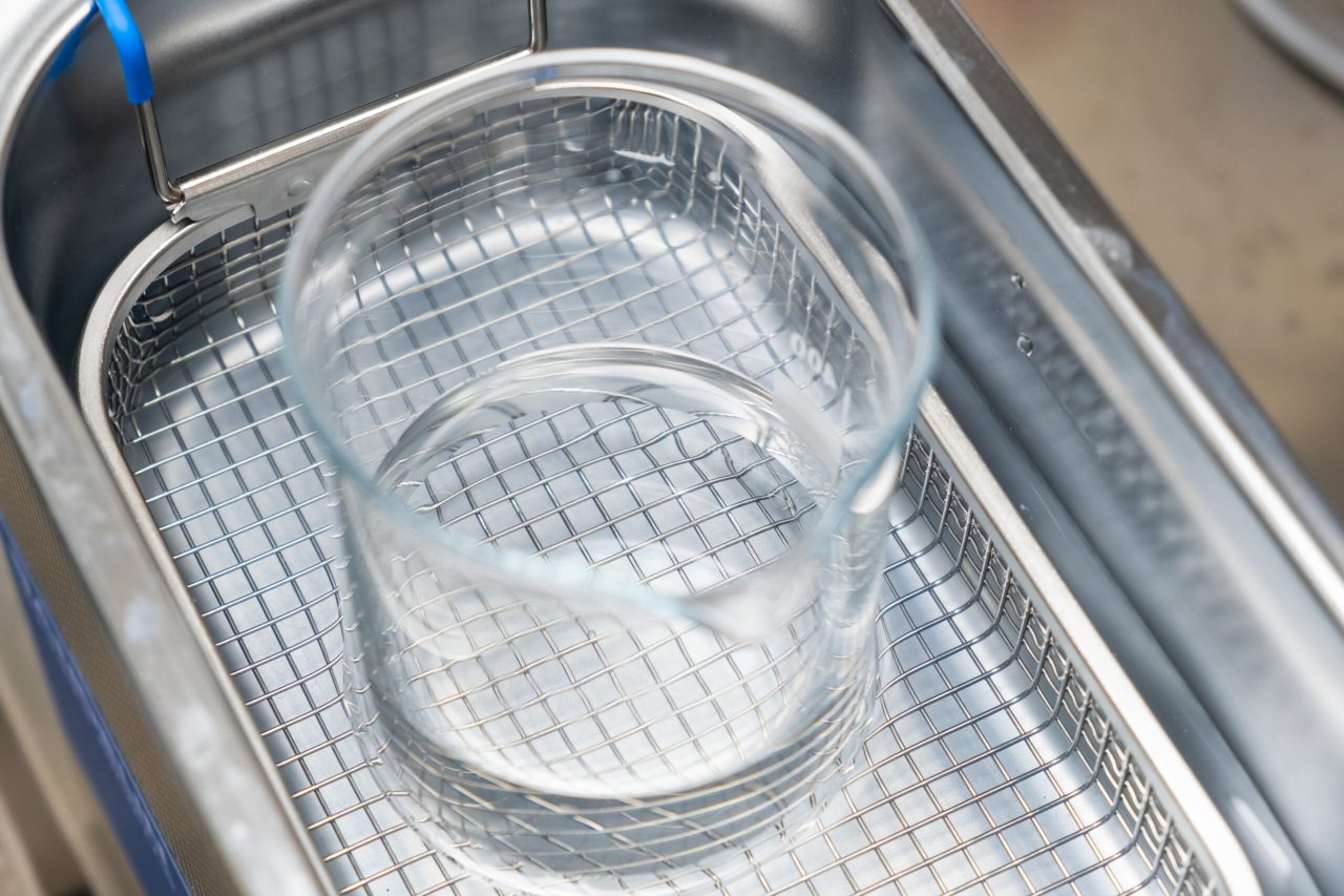 chemical-beaker-in-ultrasound-bath-for-cleaning-an-2021-12-15-23-17-34-utc-scaled-1280x853.jpg